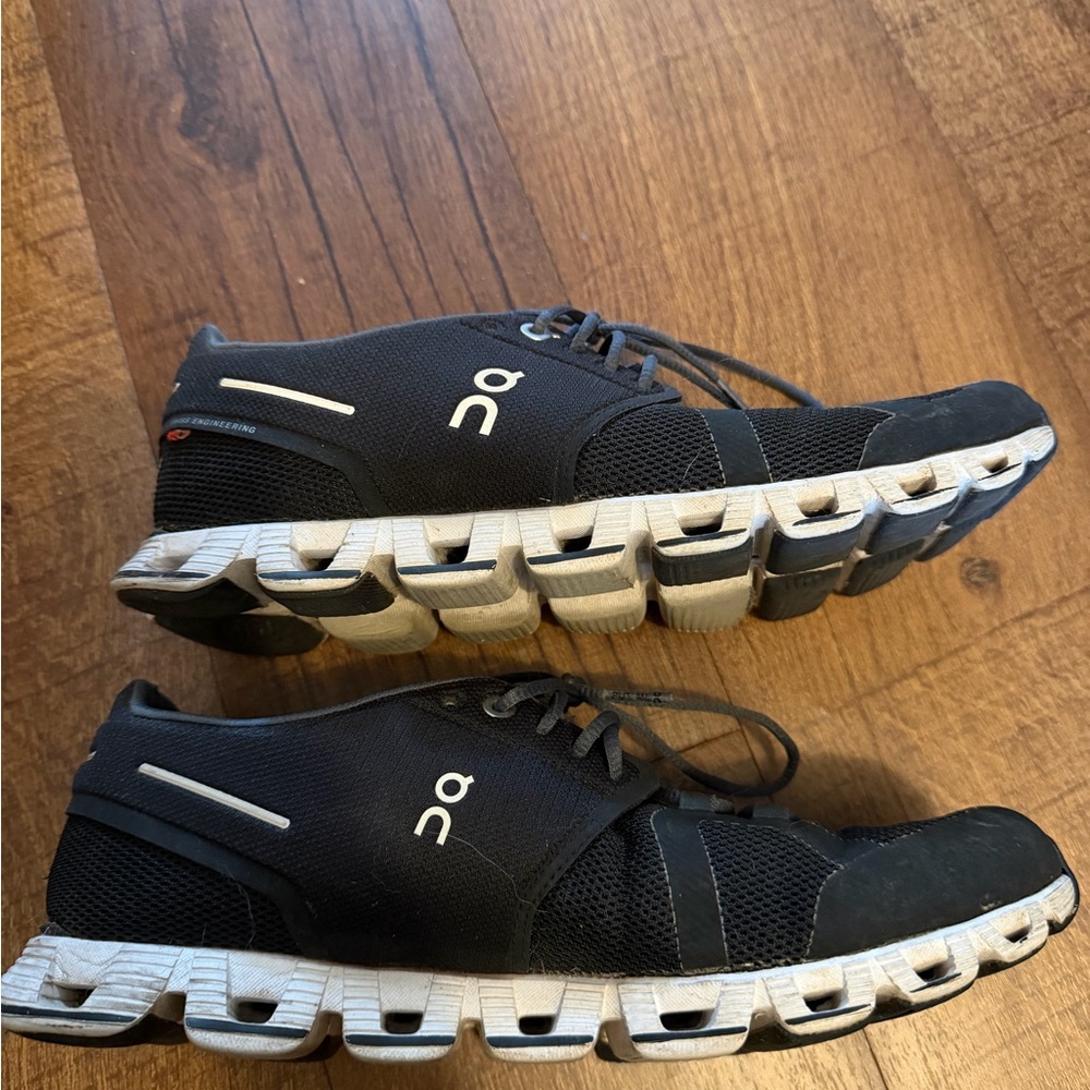 On Running women’s black and White Athletic Shoes